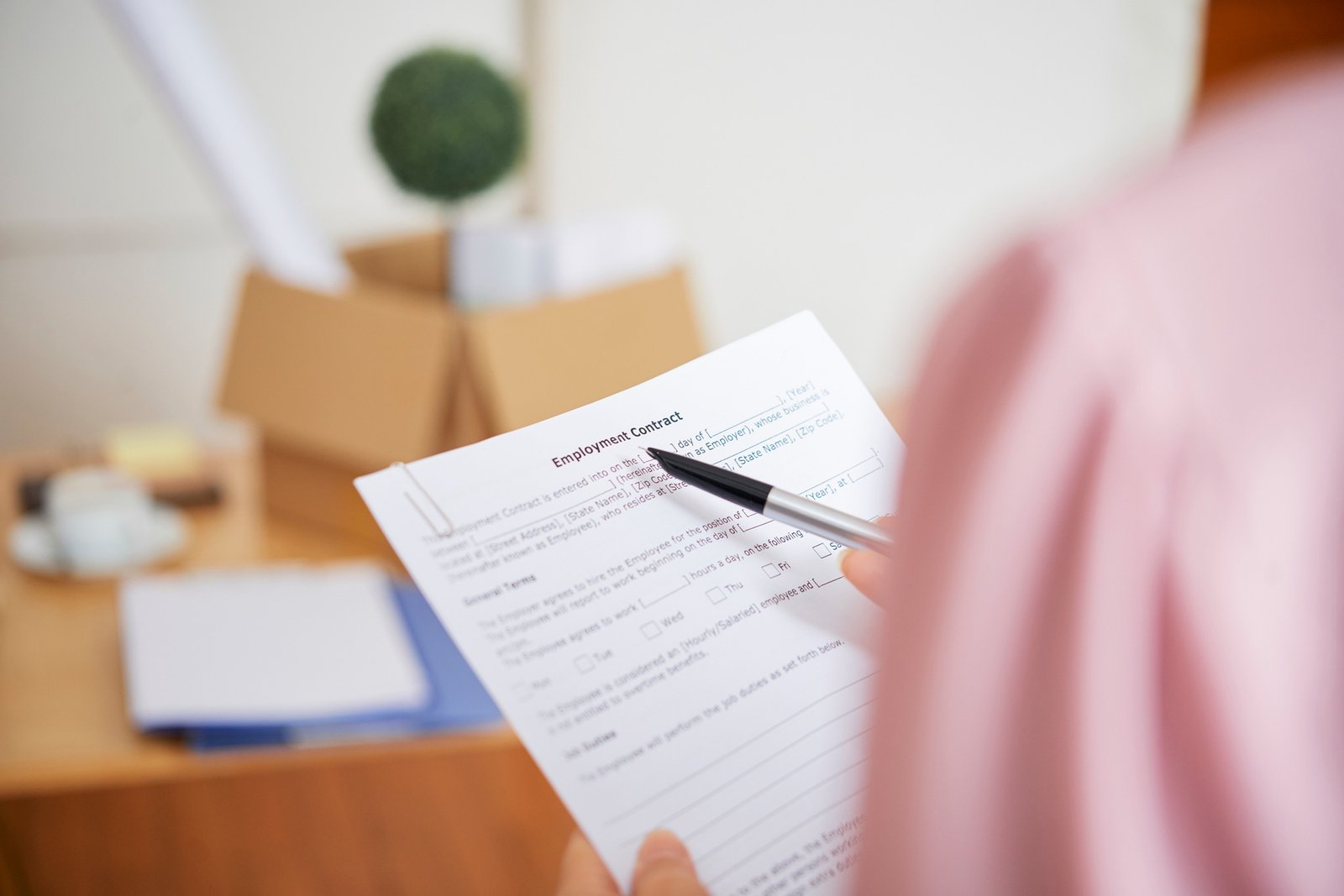 Businesswoman reading employment contract